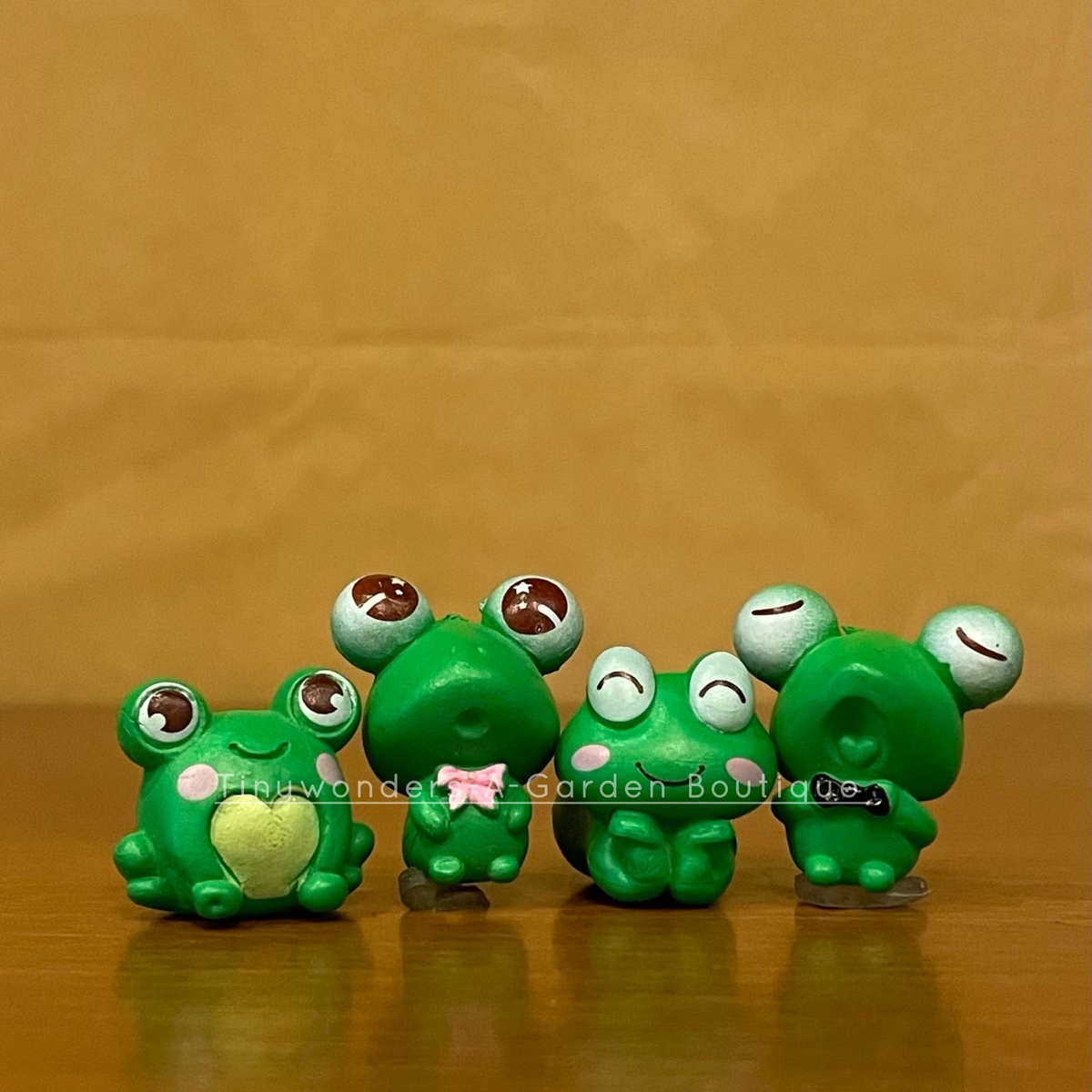 #266 Miniature Funny Frogs ( set of 2 ) random design