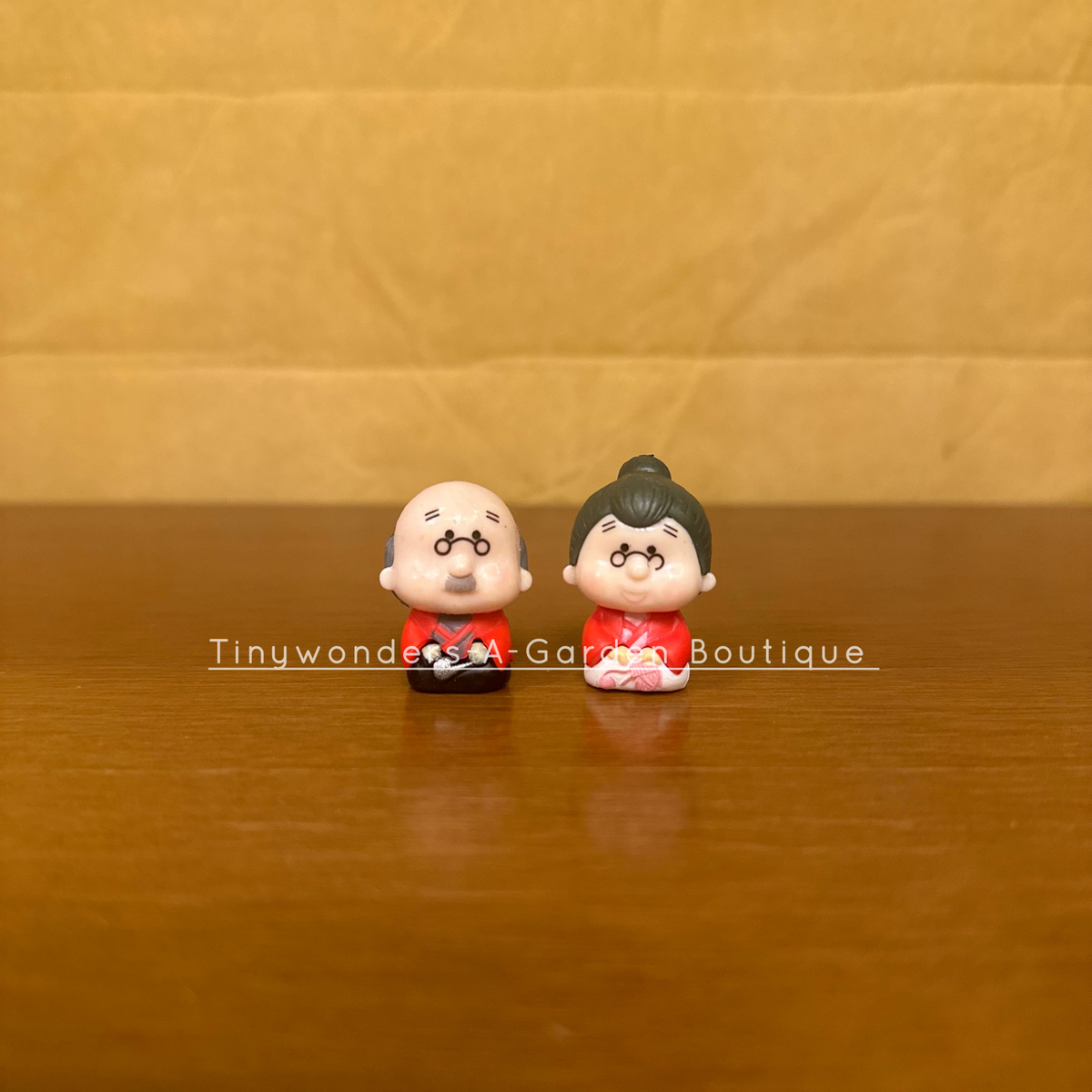 #397 Miniature Sitting Grand Parents ( per pair )